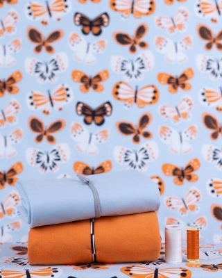 Butterflies organic jersey, light blue - orange